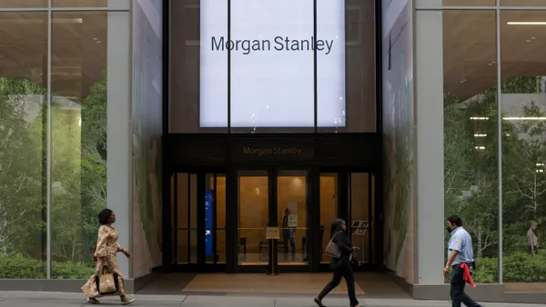 People walk past Morgan Stanley's 522 Fifth Avenue Branch in Midtown Manhattan on July 7, 2022.
