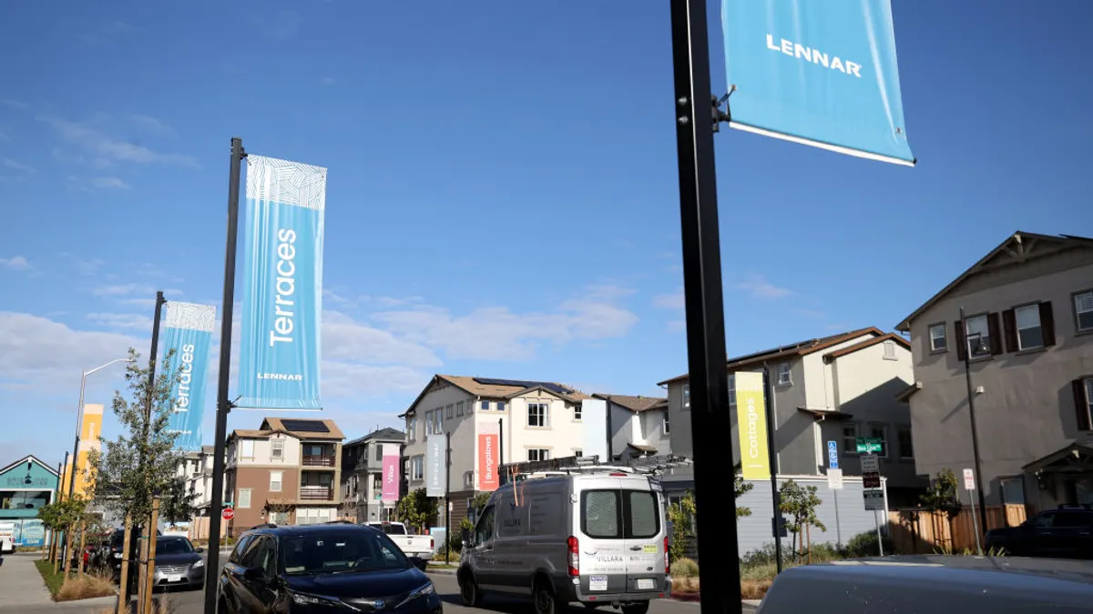 Banners line the street at the Lennar Bridgeway home development on December 15, 2021 in Newark, California.