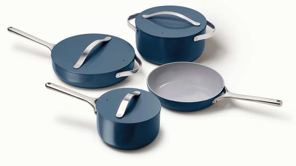 Set of pots and pans from Caraway in the color blue.