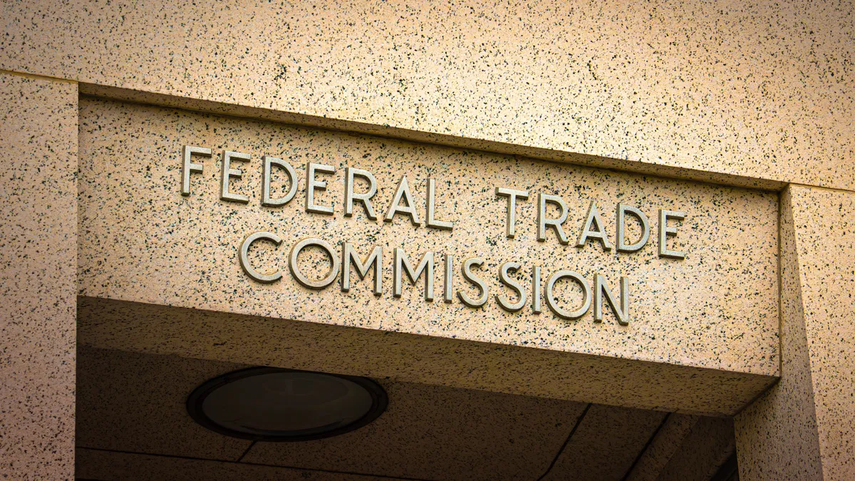 Sign on doorway for the Federal Trade Commission in Washington, D.C.