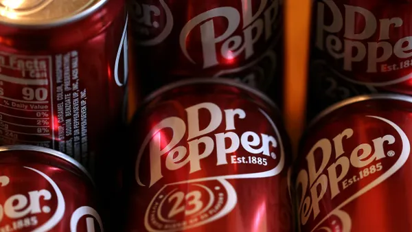 Cans of Dr Pepper on display.
