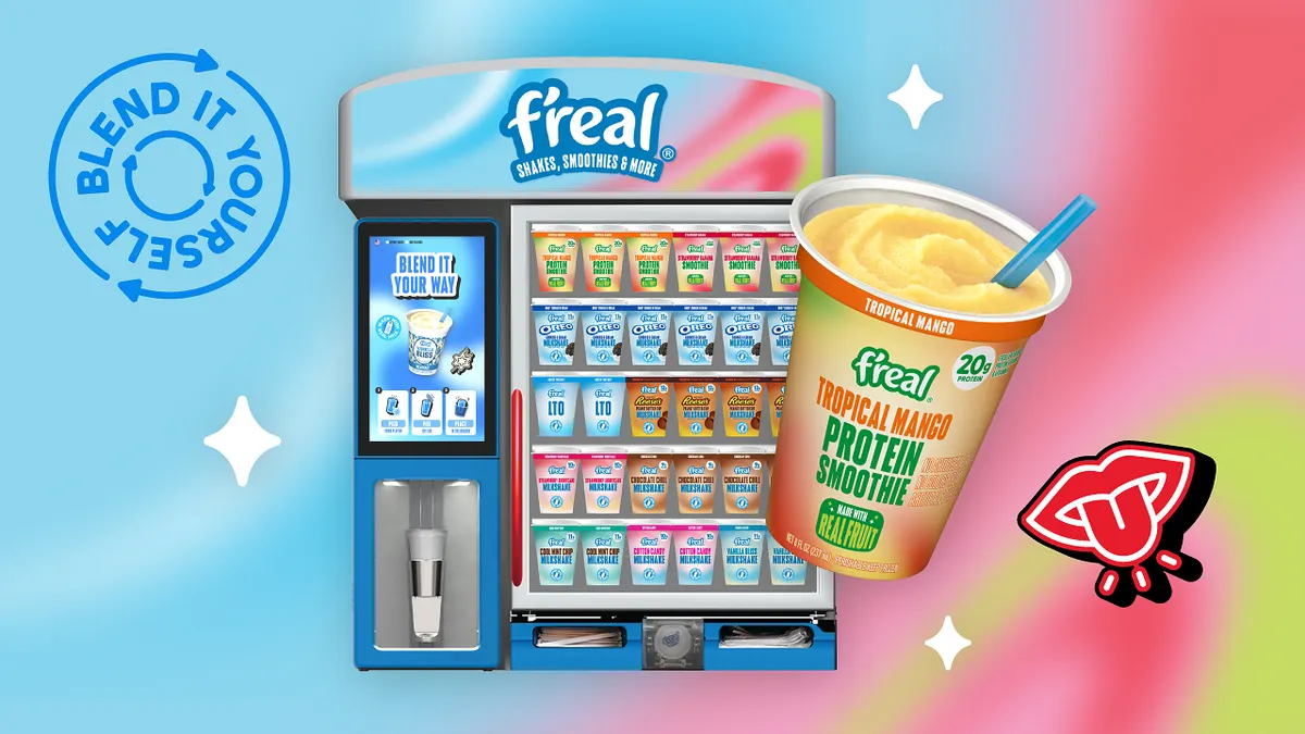 An image of a cup in front of a blender and cooler, against a background of blue, red and yellow gradients in irregular patterns. Text on the machine says "f'real shakes, smoothies and more" and text on the cup says "f'real tropical mango protein smoothie. 20 g protein."