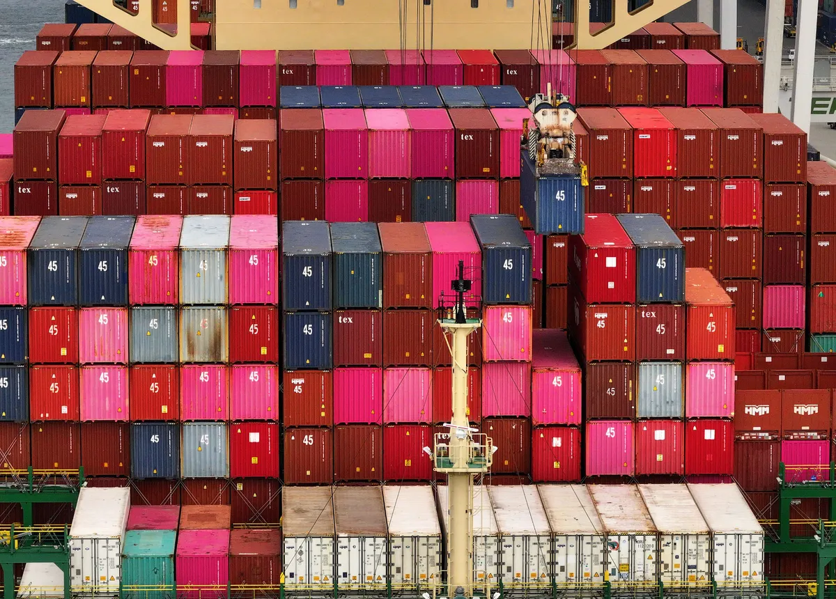 Shipping containers are stacked on a container ship at the Port of Oakland on Aug. 1, 2025, in Oakland, California.