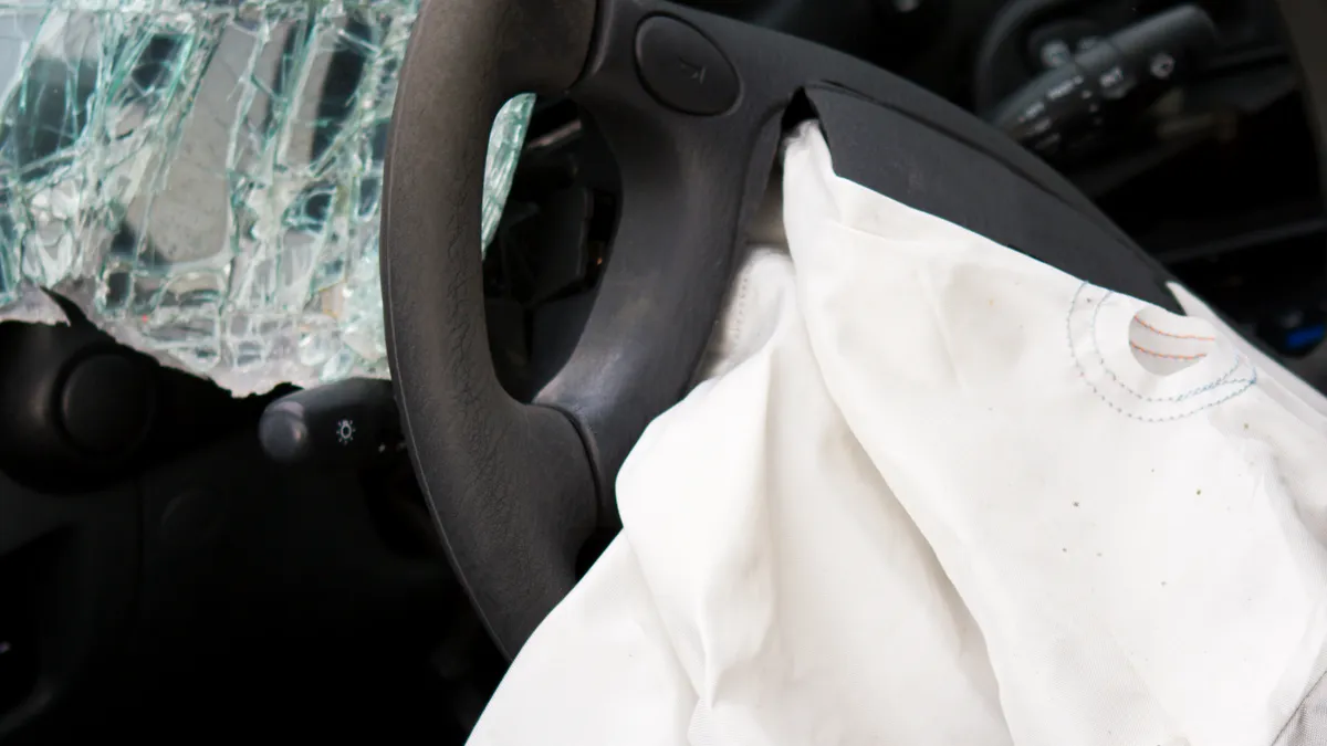 A deployed airbag after a motor vehicle crash.