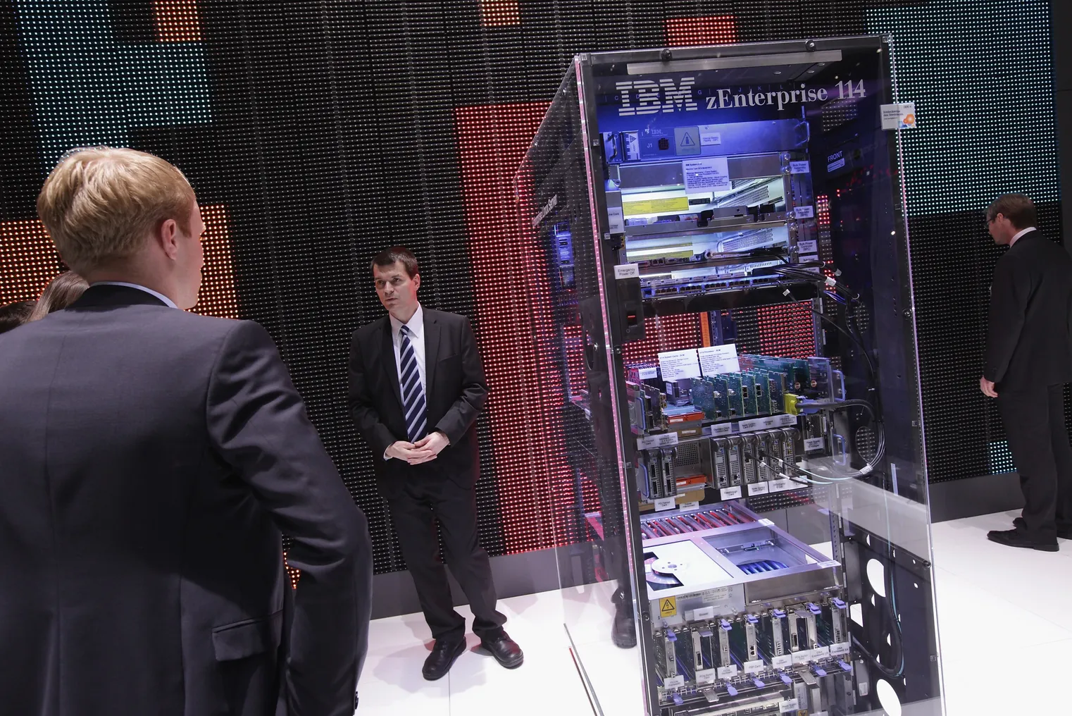 A stand host explains a zEnterprise 114 high-performance mainframe at the IBM stand on the first day of the CeBIT 2012 technology trade fair on March 6, 2012 in Hanover, Germany.