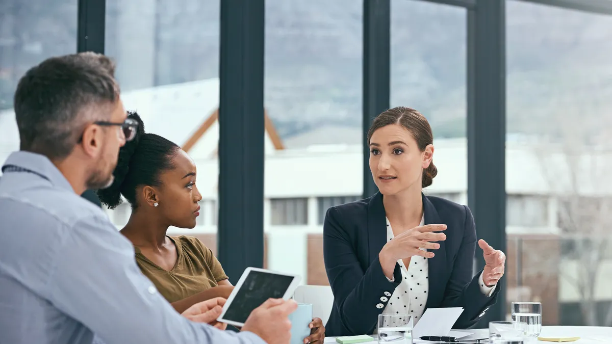 Cropped shot of a group of colleagues having a meeting in an office