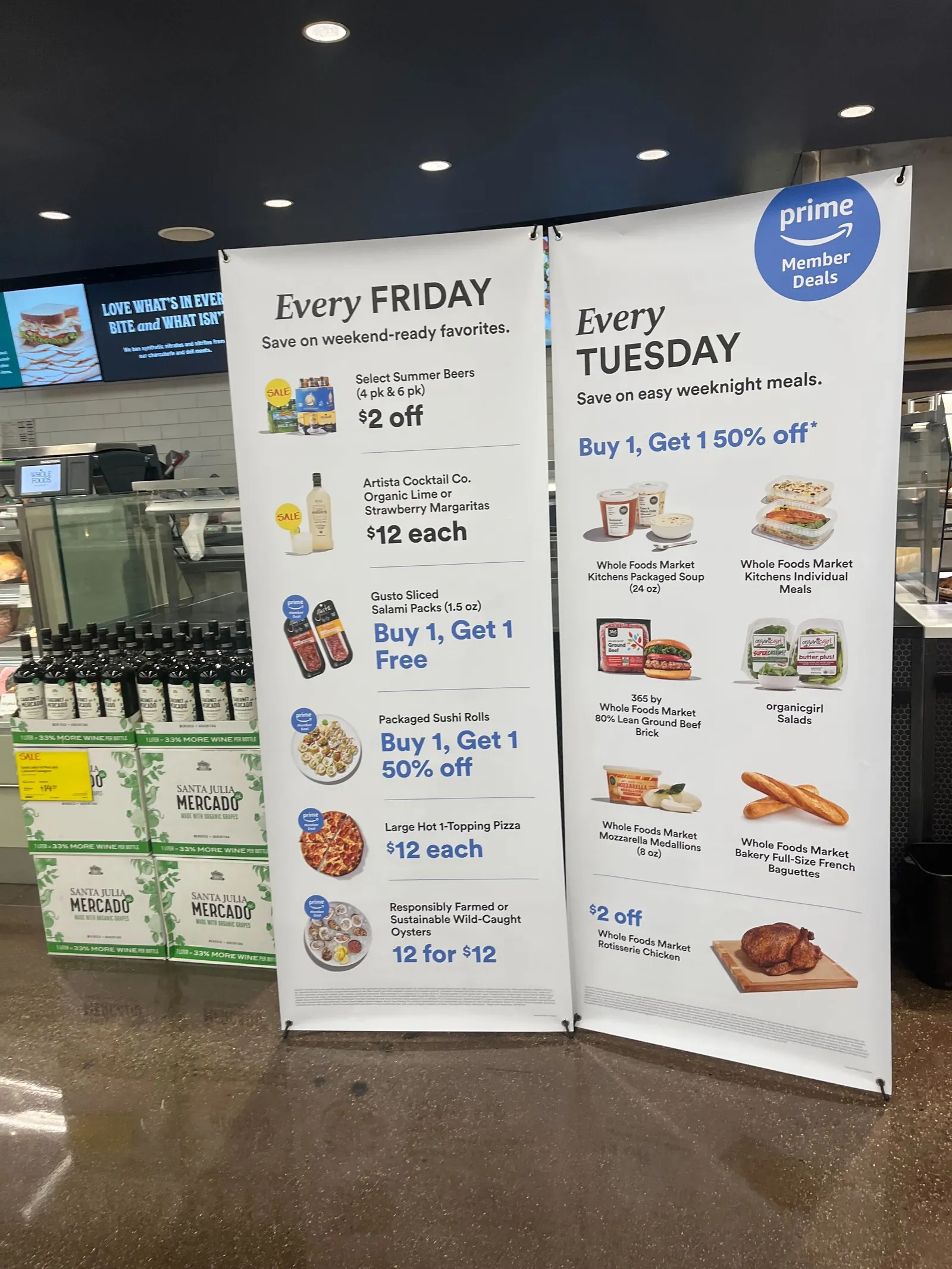 Signage at Whole Foods Market offering discounted meal options on Fridays and Tuesdays