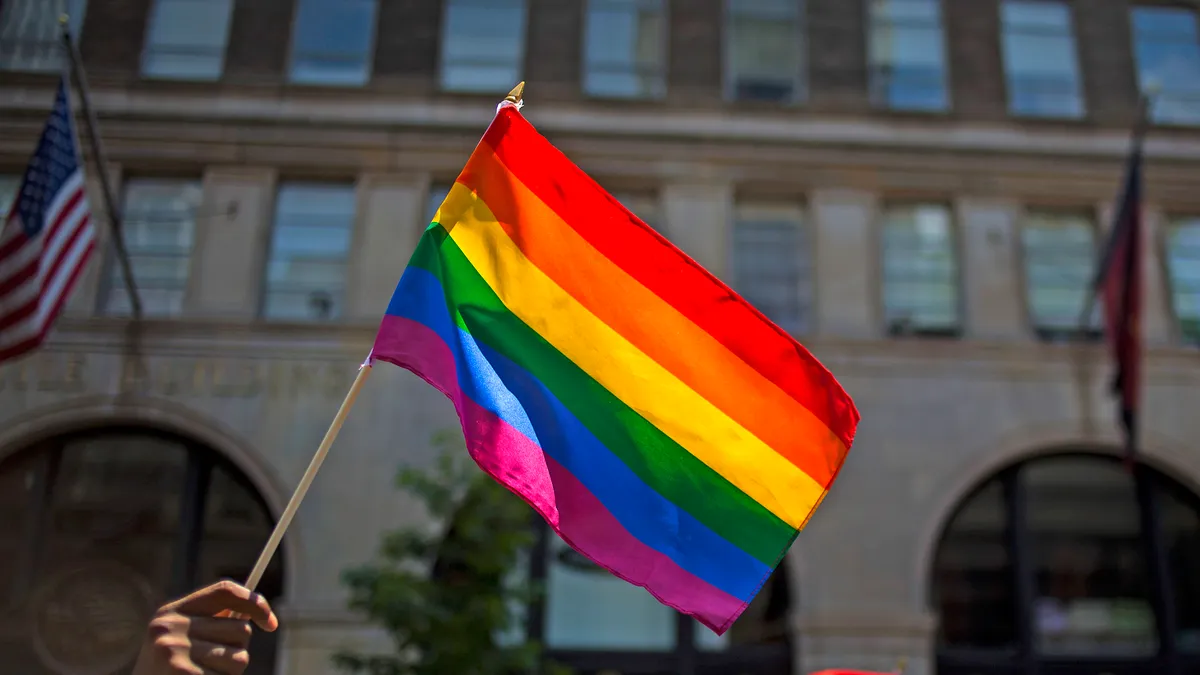 Marchers walk down 5th Avenue during the 2014 Gay Pride March on June 29, 2014 in New York City.