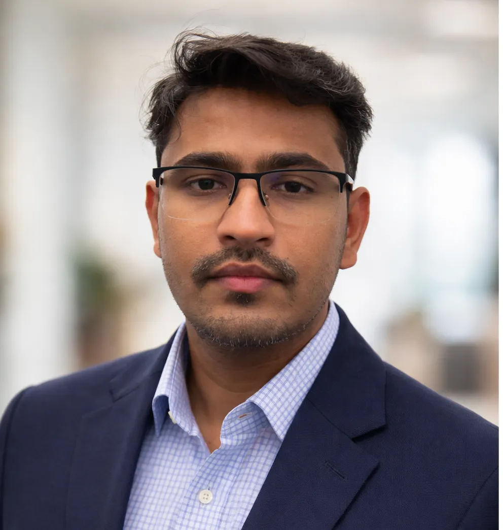 A headshot of Aditya Kambhammettu of Amazon Web Services.