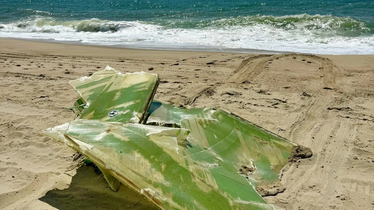 A piece of fiberglass on a beach in Nantucket.