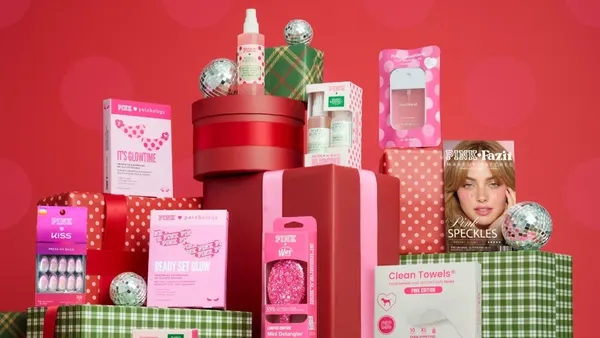 A collection of beauty products stacked on top of each other.