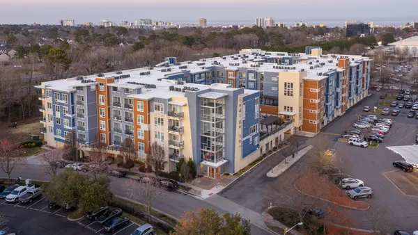 Aerial view of mid-rise apartment complex.