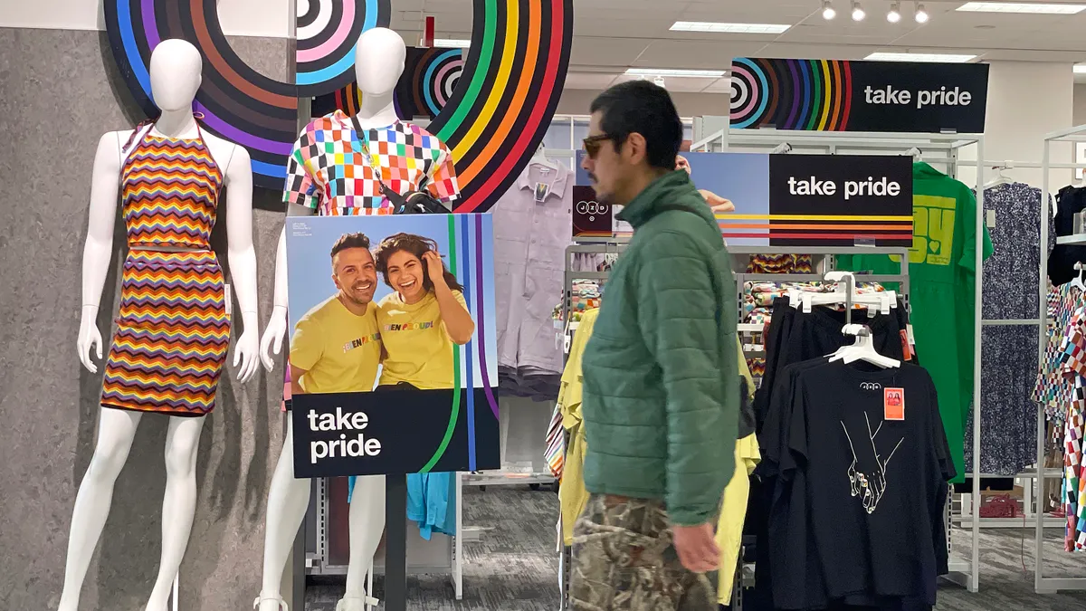 A customer walks by a Pride Month merchandise display at a Target store on May 31, 2023 in San Francisco,