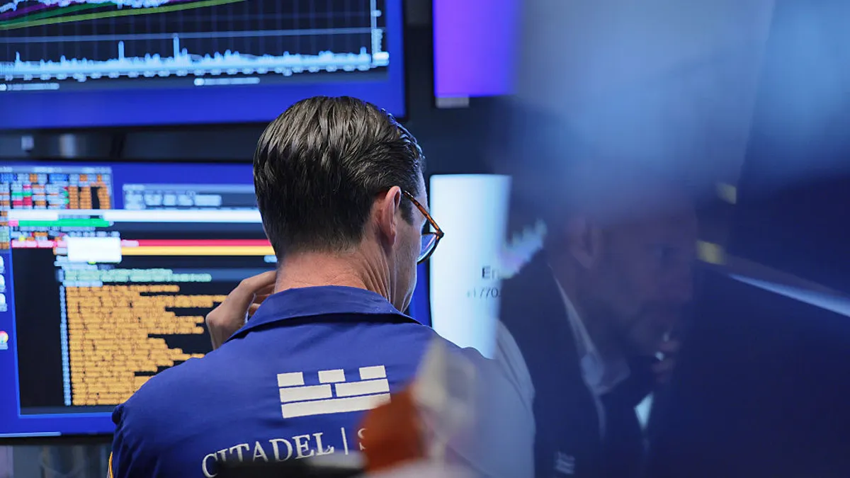 Traders work on the floor of the New York Stock Exchange during morning trading on June 04, 2026 in New York City. Stocks opened mixed, with the S&P 500 and Nasdaq falling while the Dow Jones Industrial Average rose more than 500 points after dropping 600 points at the previous day's close. (
