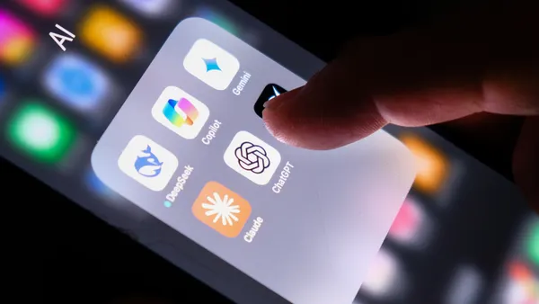 Apple iPhone screen with AI icons for ChatGPT, DeepSeek, Gemini, Copilot, Grok and Claude pictured.