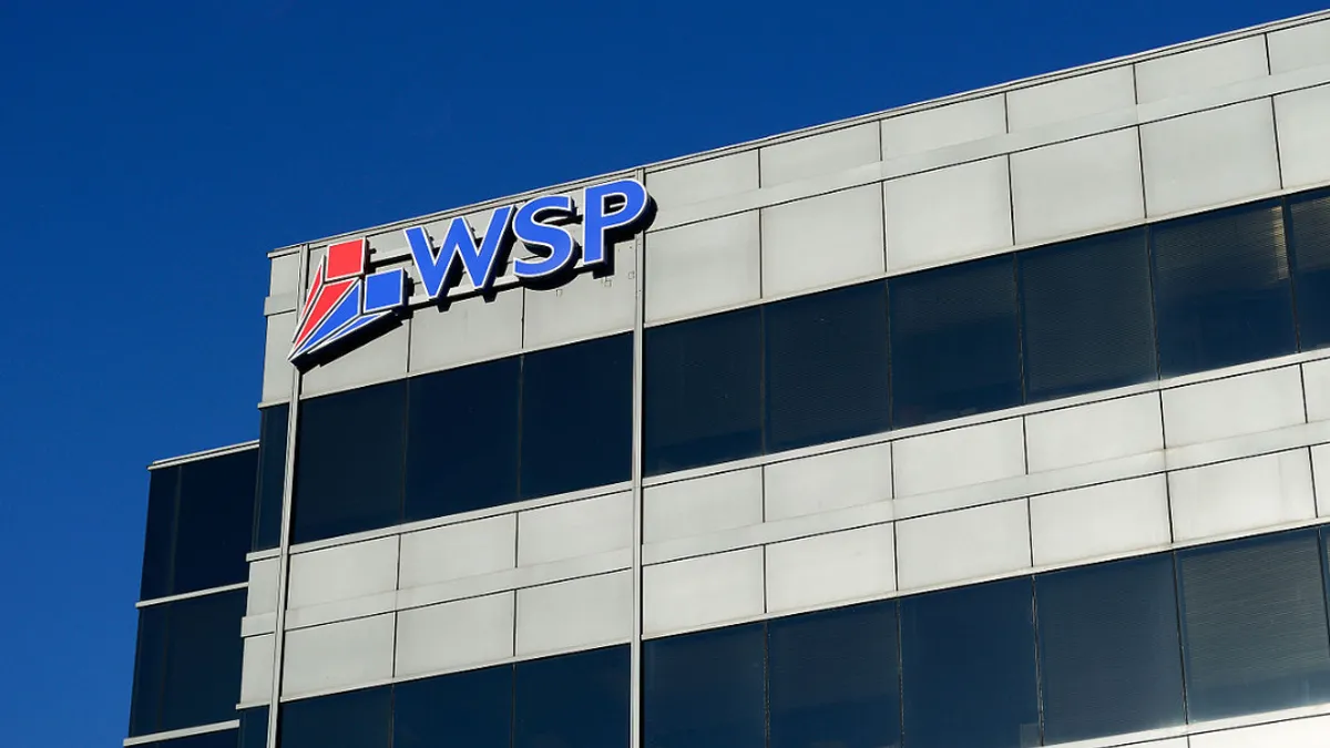 Silver buildling against a bright blue sky shows WSP logo.