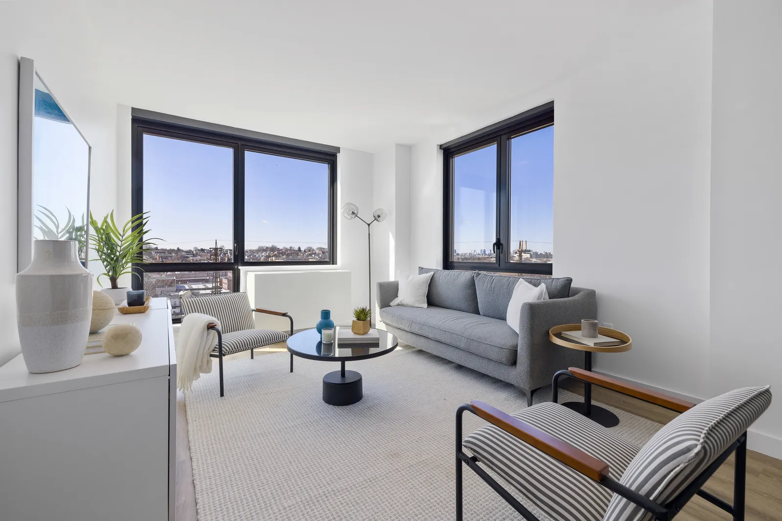 A white room with a table and chairs.