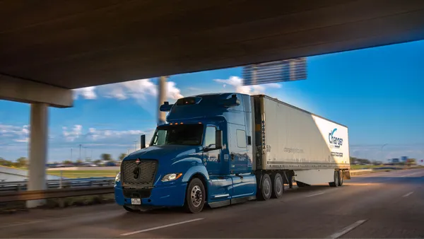 Aurora truck in motion on highway