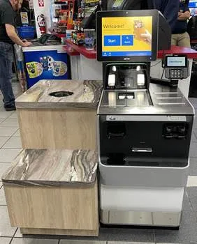 A photo of a self checkout kiosk in a Parkland store