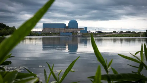 Storm clouds moving over a nuclear reactor power plant