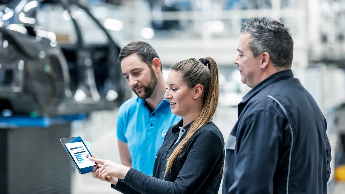 Workers use ChatGPT in a Mercedes-Benz factory.