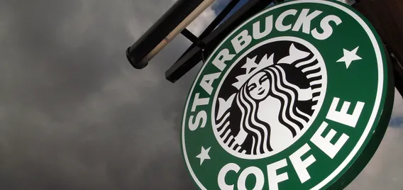 The Starbucks logo hangs outside one of the company's cafes in Northwich on 3 July, 2008 in Northwich, England.