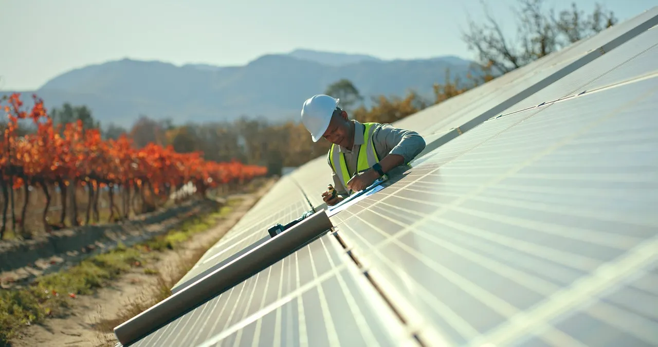 Engineer working on a renewable energy farm