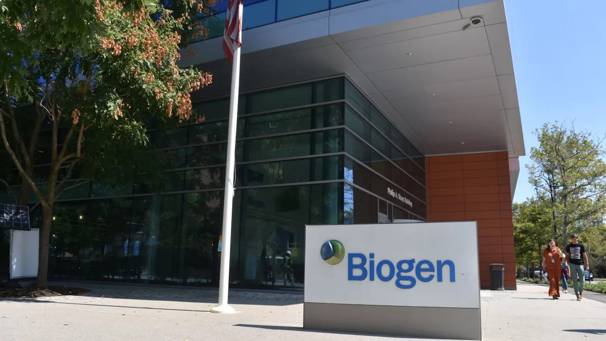 A sign with Biogen's logo sits outside the company's Cambridge, Massachusetts, headquarters on Sept. 5, 2024.