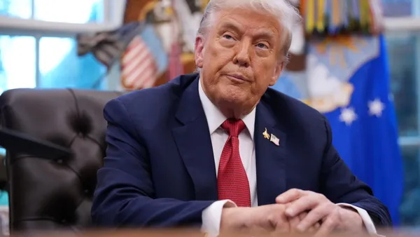 President Donald Trump sits in the Oval Office of the White House on Sept. 25, 2025, in Washington, D.C.