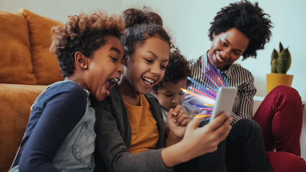 Family looking at phone