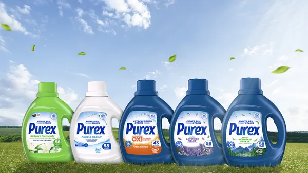 lineup of five bottles of Purex laundry detergent