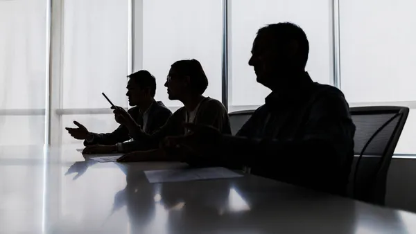 Executives at conference table