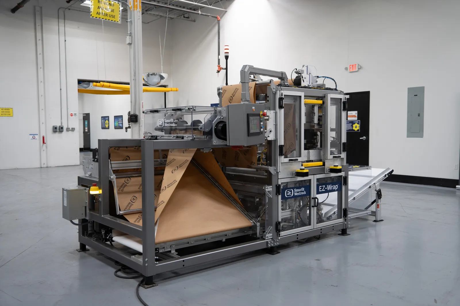 A piece of industrial equipment with fiber material strung through.