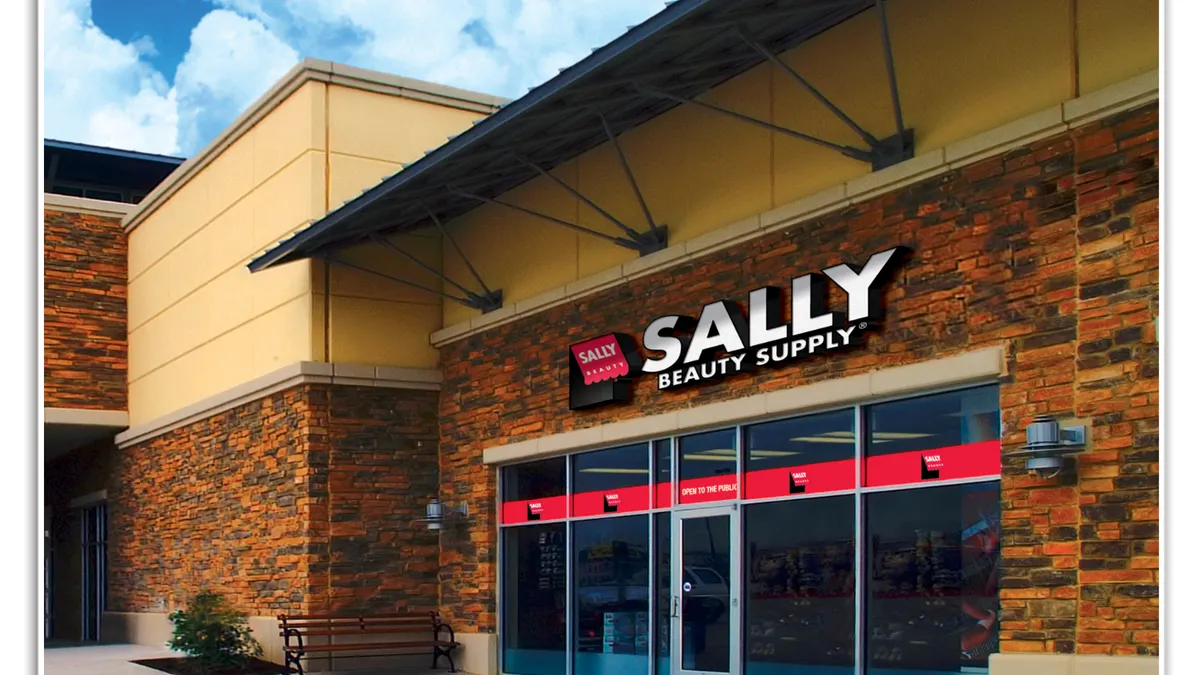 A brick storefront with a sign reading Sally Beauty Supply