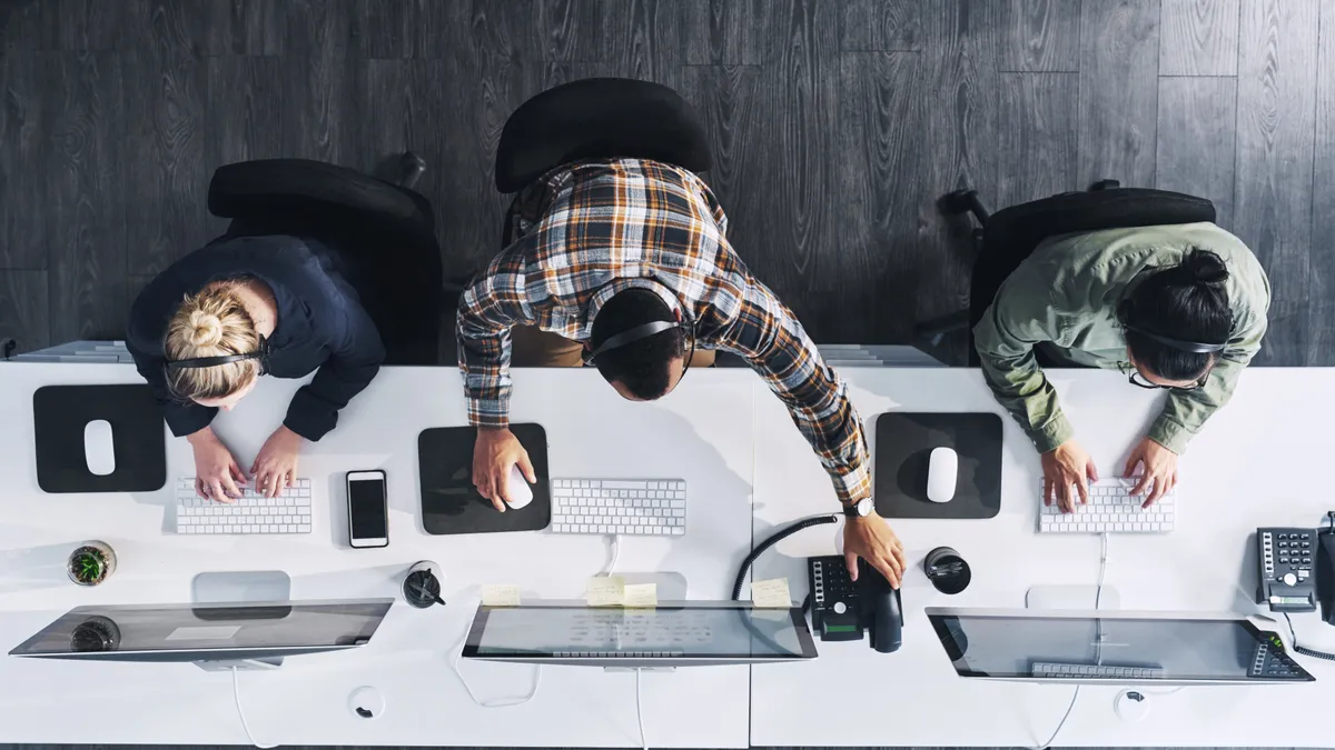 High angle shot of a group working in an office