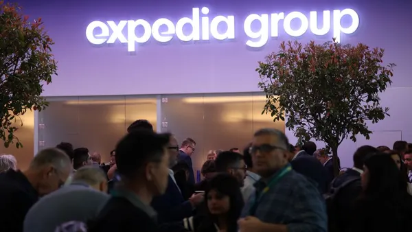 People visit the Expedia Group stand at the 2026 ITB tourism trade fair on March 04, 2026 in Berlin, Germany.