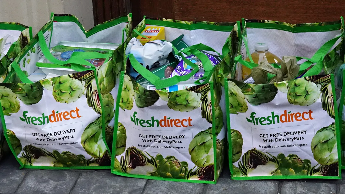 FreshDirect bags filled with grocery items.