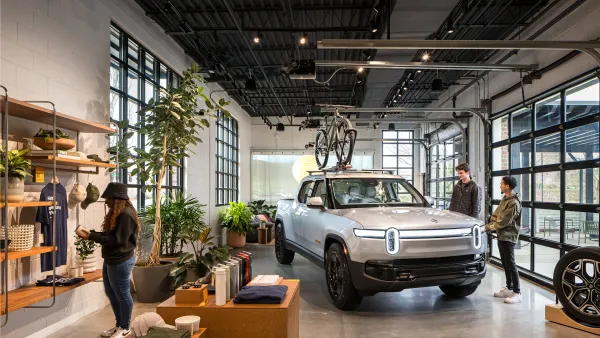 Customers browse products at a Rivian Spaces showroom in Alpharetta, Georgia.