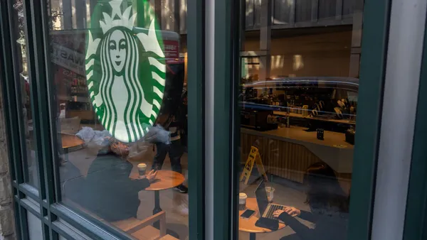 People sit in a coffee shop.