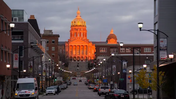 The Iowa Capitol building illuminated by the sun.