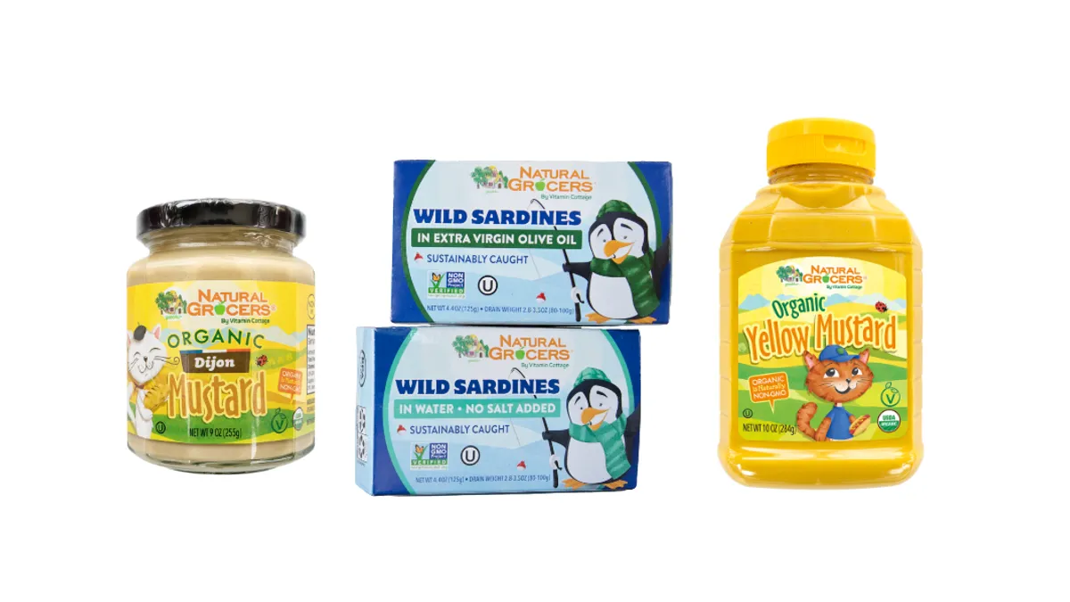 Two mustard jars and two packages of wild sardines