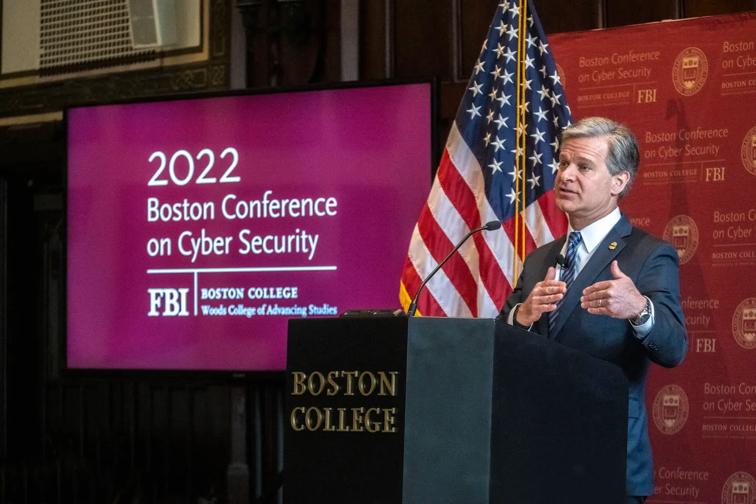 FBI Director Christopher Ray speaking at the annual Boston Conference on Cyber Security