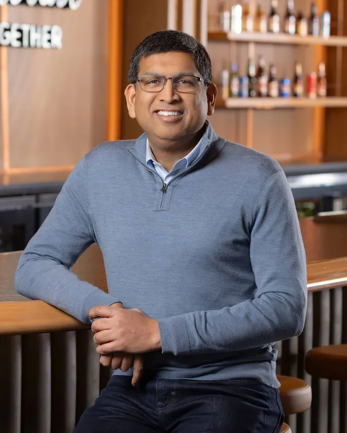Rahul Goyal sits for a professional headshot.