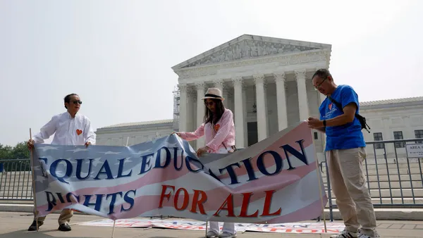 Anti-affirmative action activists with the Asian American Coalition for Education protest outside the U.S. Supreme Court Building on June 29, 2023 in Washington, DC.