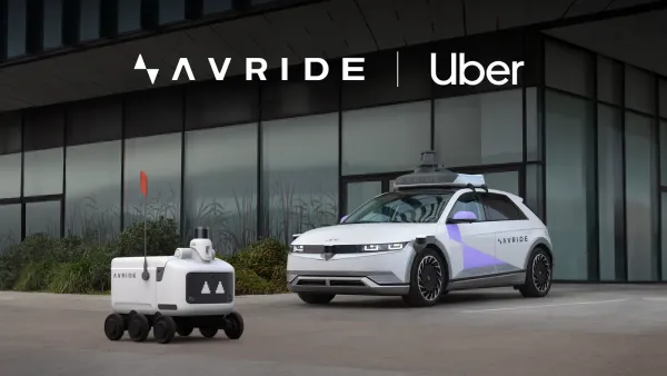 Two autonomous vehicles with Avride and Uber branding