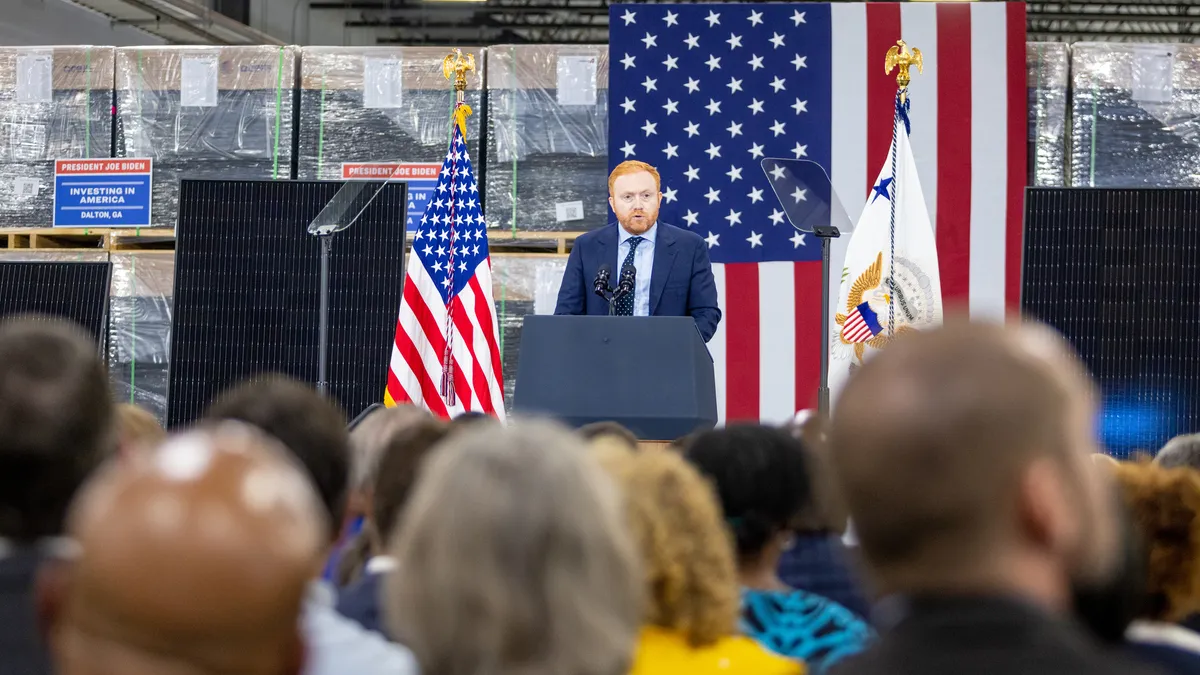 Summit Ridge Energy's CEO, Steve Raeder, speaks during Vice President Kamala Harris's March 6 visit to Qcells' Georgia solar manufacturing facility.