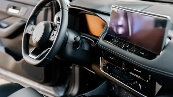 Close-up of a car steering wheel in a modern new car