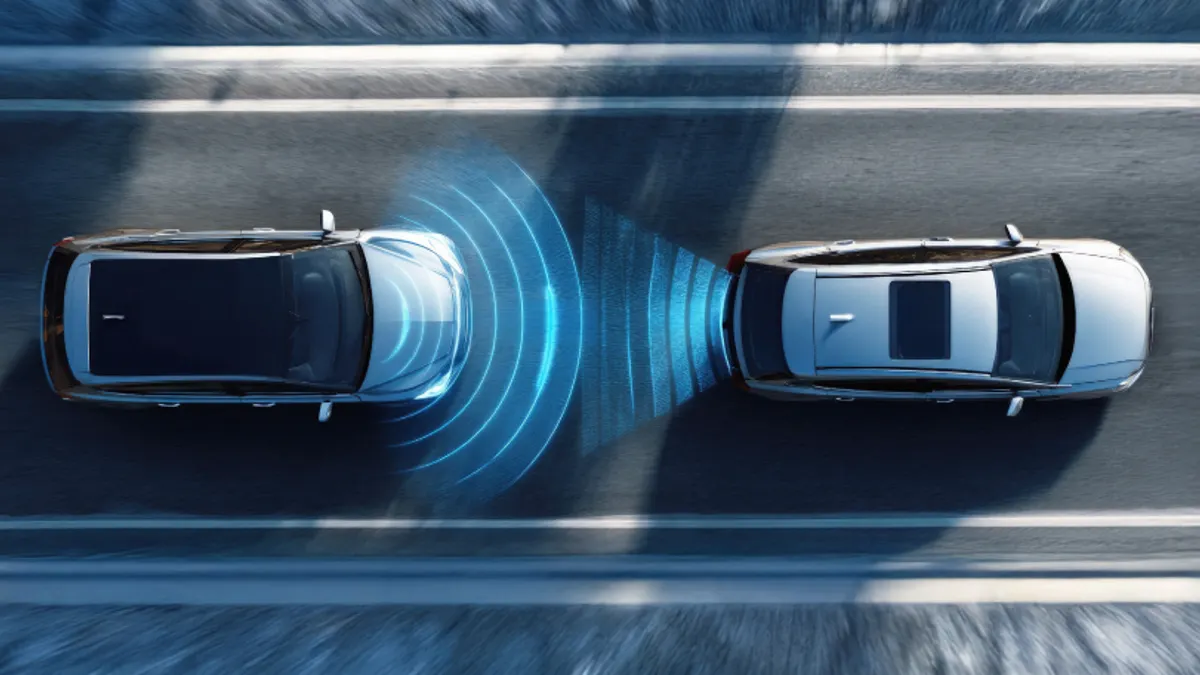 Two cars driving on highway