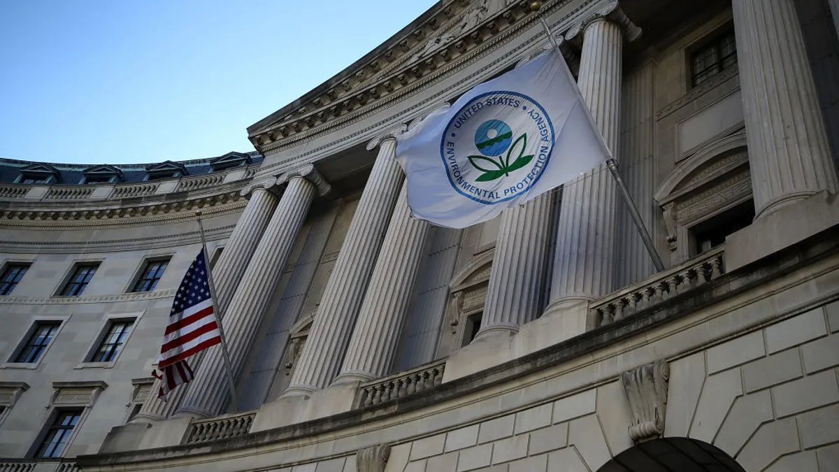 Exterior of the U.S. EPA headquarters with two flags flying