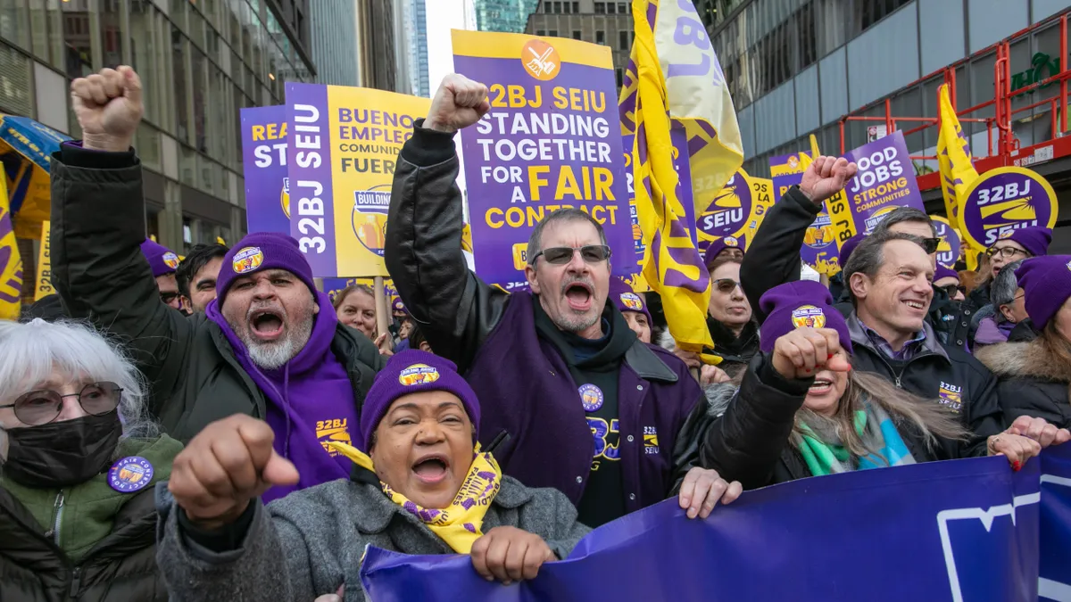 A view of building workers holding a rally in New York City in a push for better wages, health insurance and job protection